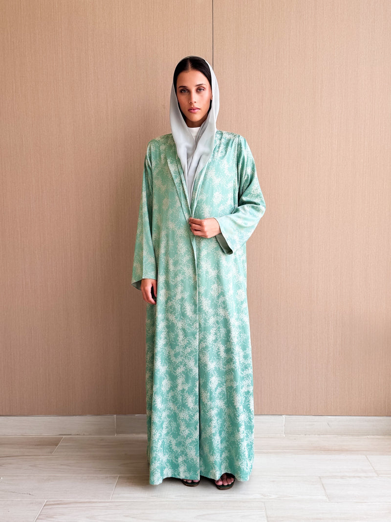 Zainah Cut Silk Prented Abaya in Creme Flowers on Sea Green