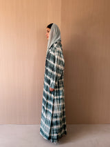 Zainah cut abaya in dark green with cream printed stripe
