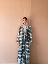 Zainah cut abaya in dark green with cream printed stripe
